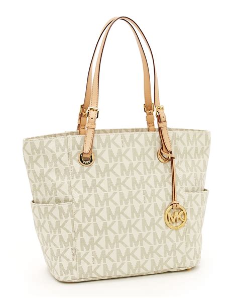 michael kors handbag jet set item large signature tote vanilla|Michael Kors jet set airplane.